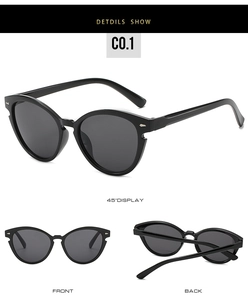Detailansicht der schwarzen Cat-Eye-Sonnenbrille mit rautenförmigen Metallnieten