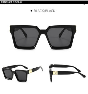 Detailansichten der schwarzen übergroßen quadratischen Sonnenbrille mit Goldakzenten