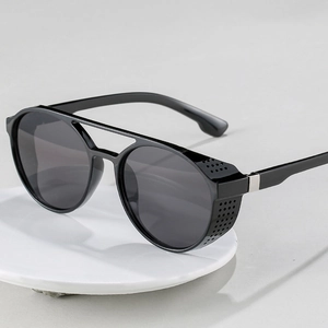 Retro steampunk sunglasses with black round frames and metal side mesh shields