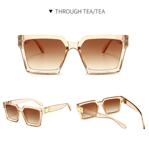 Mehrere Ansichten der eckigen Tee-Sonnenbrille mit Verlaufsgläsern und Golddetails