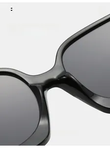 Close-up of comfortable nose pads and smooth black frame of stylish oversized sunglasses