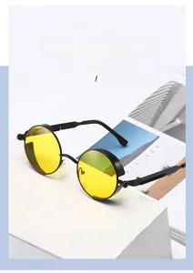 Detail view of steampunk sunglasses with yellow lenses and metallic side shields