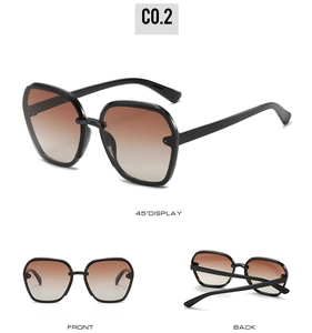 Detailed multi-angle views of black geometric oversized sunglasses with brown gradient lenses