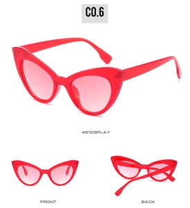 Trois angles de lunettes de soleil œil de chat rouges avec monture transparente et verres