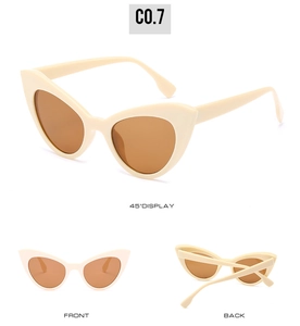 Trois vues de lunettes de soleil œil-de-chat rétro beige crème avec verres teintés et monture