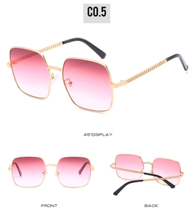 Detailed views of vintage square sunglasses featuring gold chain temples and pink gradient lenses