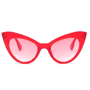 Lunettes de soleil œil-de-chat rouges avec monture translucide et verres dégradés
