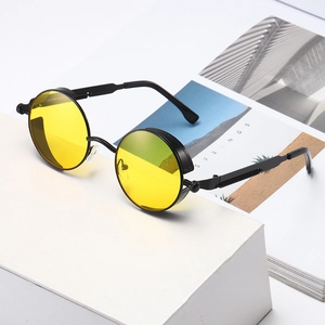 Steampunk round sunglasses with yellow lenses and black metal spring hinge frame