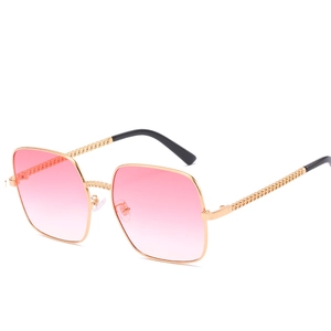 Women's vintage oversized square sunglasses with pink gradient lenses and gold chain arms