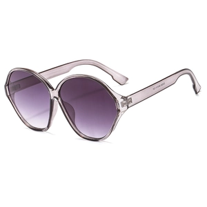 Fashionable oversized oval sunglasses with purple gradient lenses and translucent frames