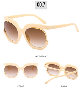Detailed multi-angle view of beige oversized sunglasses with gold metal side accents