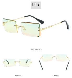 Detail view of rimless square sunglasses with gradient lenses and gold hollow metal temples