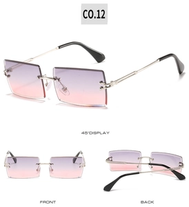 Detail view of rimless rectangular sunglasses with purple-pink gradient lenses