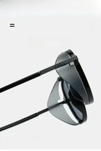 Detail view of lightweight black plastic steampunk frame showing flexible temples and hinges