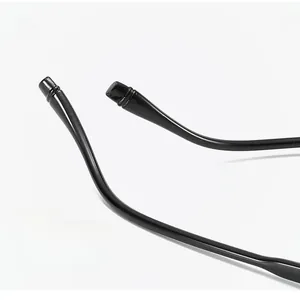 Macro detail of ergonomic black resin temple tips with anti-slip grooves for comfort