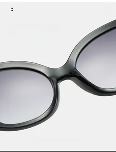 Close-up of comfortable integrated nose pads on black fashion oversized sunglasses