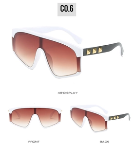 Three-angle view of white oversized sunglasses with gold rivets and brown gradient lenses