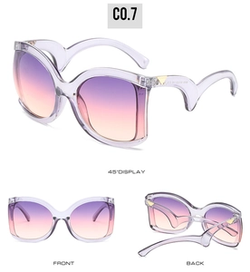 Detailed views of oversized sunglasses with purple gradient lenses and metal accents