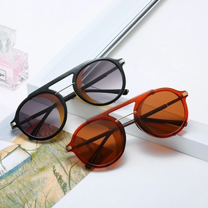 Steampunk round frame sunglasses in black and amber colors with double bridge design