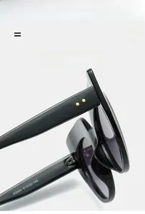 Detailed macro view of black square frame sunglasses hinges and K9620 size specifications