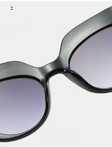 Close-up of comfortable integrated nose pads on black oversized fashion sunglasses