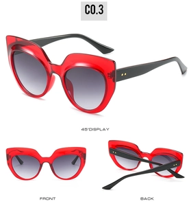 Three-way view of red oversized cat-eye sunglasses with gold rivet accents and gradient lenses