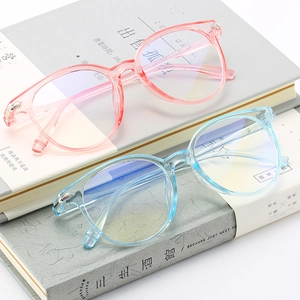 Retro round clear glasses frames in transparent pink and blue with diamond metal accents