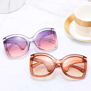 Oversized gradient sunglasses for women, fashion runway style in purple and amber brown