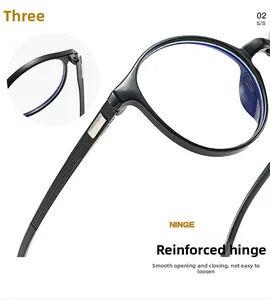 Detail of vintage round frame glasses showing the reinforced metal hinge for durability