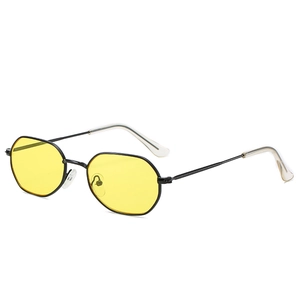 Occhiali da sole poligonali con montatura in metallo e lenti gialle in stile retrò chic