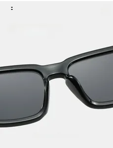 Detail of comfortable nose pads on black square sunglasses with polished finish