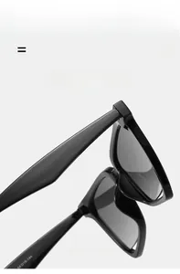 Detail shot of black irregular sunglasses showing 54-18-144 temple sizing parameters