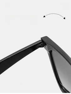 Close-up of durable metal hinge on stylish irregular black oversized sunglasses