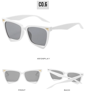 Three angles of white cat-eye sunglasses with grey lenses and gold triangle detail
