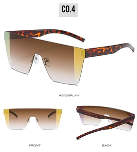 Détail de lunettes de soleil masque avec branches en écaille et accents jaunes vifs