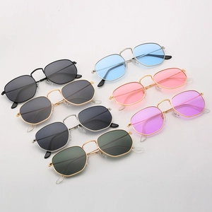 Vintage polygonal metal sunglasses displayed in various lens colors on a grey background