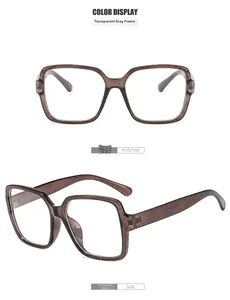Detail view of transparent grey square frames showing front and 45-degree angle profiles