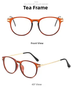Detailed close-up of retro round tea-colored eyeglass frames with gold metal temple hinges