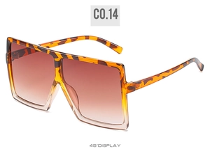 45-degree angle view of oversized square sunglasses with tortoise shell frame and gradient lenses