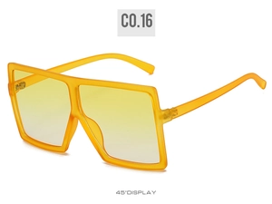 Detail view of oversized orange translucent square sunglasses at a 45-degree angle