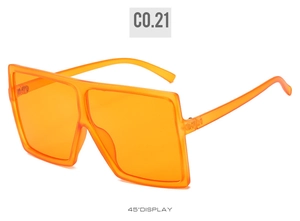45-degree angle of translucent bright orange oversized square frame sunglasses
