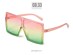 Detail view of pink square oversized sunglasses with colorful vertical gradient lenses