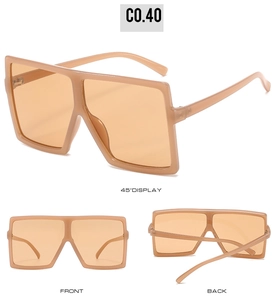 Detailed views of stylish oversized square sunglasses in nude frames and orange lenses