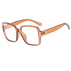 Classic amber square thick frame glasses with transparent lenses in a retro oversized style