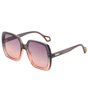 Modern oversized square sunglasses with gradient purple lenses and golden temple detail