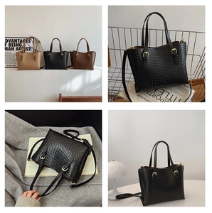 Detail of woven textured tote bag featuring adjustable strap and classic metal buckle