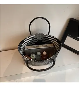 Top view of large woven tote interior showing spacious storage for daily items