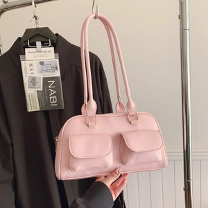 Pink minimalist Boston shoulder bag with dual front pockets and gold buckles in casual style