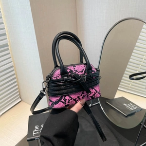 Pink and black snake pattern mini handbag with black handles and metal buckle detail