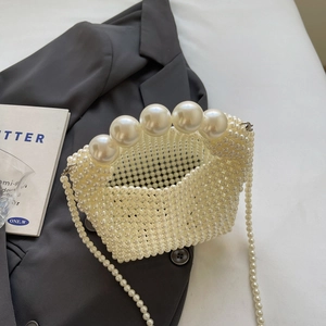 Handmade white pearl woven handbag with large bead handle and long chain strap